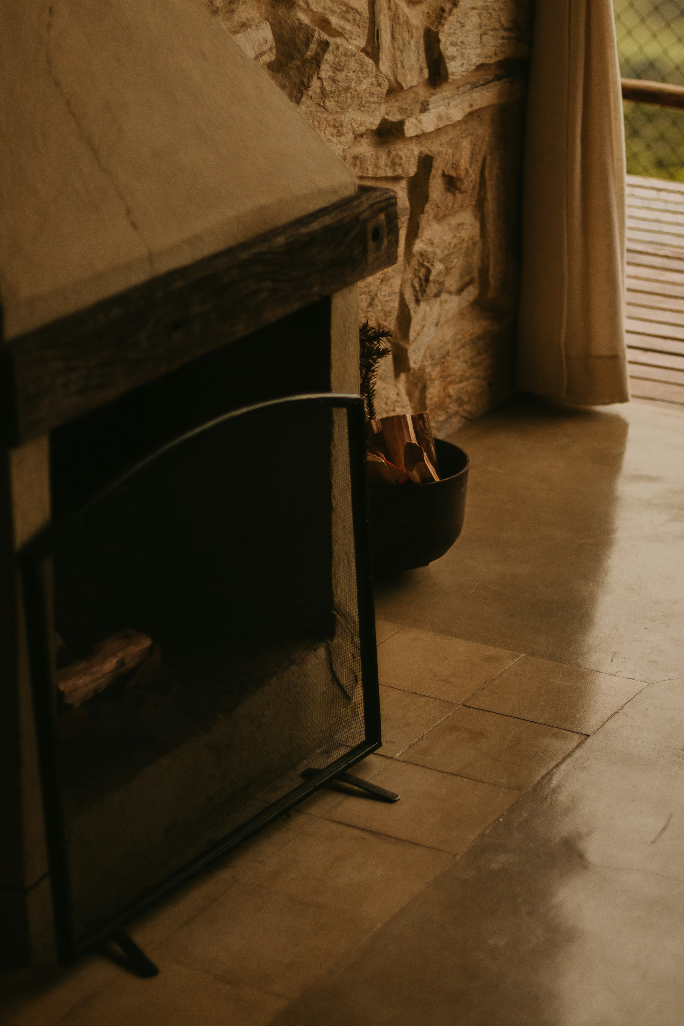 Stone fireplace in an interior living room